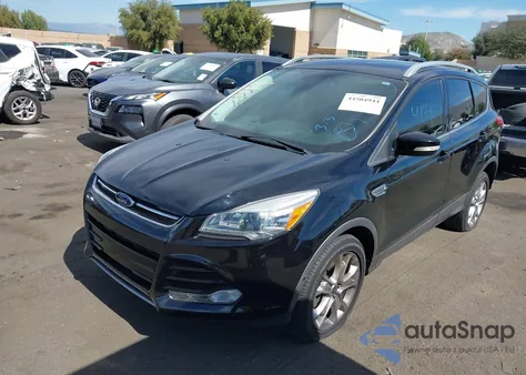 2016 Ford Escape Titanium из США, поврежденный, VIN 1FMCU0J96GUC82528